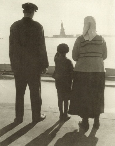 Newly arrived immigrants to America. I like to believe they're Italian, that they held fast to the Faith, and that their many descendants live lives in Christ...
